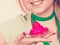 Woman holding strawberry sweet cupcake