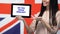 Woman holding tablet with do you speak English phrase against British flag, app