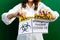 Woman holding and tearing paper with Covid-19 caution of biological hazard words. The idea or concept for happiness, free, and