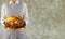 Woman holding a Thanksgiving Turkey on a Platter