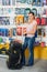 Woman Holding Tool Case In Hardware Store