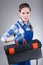 Woman holding a toolbox