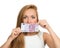 Woman holding up cash money five hundred euro in one note in han