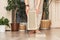 Woman is holding wooden sadhu board with nails, preparing for sadhu practice. Alternative Medicine