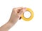 Woman holding yellow insulating tape on white background, closeup