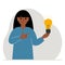 A woman holds a light bulb in his hand. Idea concept, brainstorming, business, thinking, solution, eureka, task, bingo