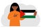 A woman holds a Palestinian flag in his hand. Vector