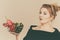 Woman holds shopping basket with vegetables, speech bubble