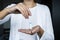 Woman holds a tampon for critical days in her hands. nurse in a white coat with a tampon in her hands. macro