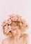 Woman holiday flowers wreath pink laugh happiness
