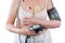 Woman with holter monitor device for daily monitoring of electrocardiogram and blood pressure