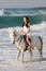 Woman horse ride water