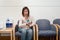 Woman in hospital waiting room