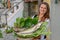 Woman hostess with fresh fish in her restaurant at Lugano on Switzerland