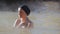 Woman in hot spring geothermal pool