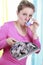 Woman with house dust allergy and asthma spray