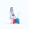 Woman housemaid holding trolley cart with supplies female cleaner janitor in uniform cleaning service concept flat full