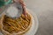 Woman icing on apple tart