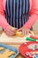 Woman icing gingerbread men