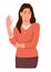 Woman ignoring smb by gesturing stop with hand, showing rejection sign. Refusal, denial, stop and negation concept