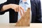 Woman imitating stepping up on wooden stairs with her fingers at table. Career promotion  concept