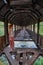 Woman inside bridge made from old abandoned train car in Georgia