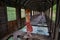 Woman inside bridge made from old abandoned train car in Georgia