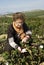 A woman inspecting cotton quality