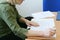 Woman intently reading the documents