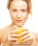 Woman isolated shot drinking orange juice