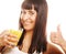 Woman isolated shot drinking orange juice