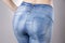 Woman in jeans close up. Beautiful female hips and buttocks