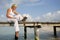 Woman on Jetty with Laptop