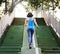 A woman jogging through the city