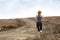 Woman Jogging on Dirt Trail