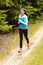 Woman jogging outdoor running countryside path