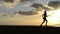 Woman Jogging At Sunset