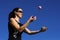 Woman Juggling Balls