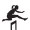 Woman jumping and running over hurdles