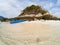 woman with a kayak on an isolated beach in Andaman sea - solo travel