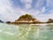 woman with a kayak on an isolated beach in Andaman sea - solo travel