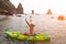 Woman kayak sea. Happy tourist enjoy taking picture outdoors for memories. Woman traveler posing in kayak canoe at sea