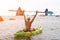 Woman kayak sea. Happy woman kayaks in sea, capturing outdoor memory with happy tourist taking photo. Volcanic mountains