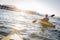 Woman Kayaking on Beautiful Mountain Lake.