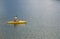 Woman Kayaking on Beautiful Mountain Lake.