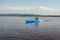 Woman kayaking on a calm lake