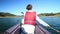 Woman kayaking on the Lokvarsko lake in Gorski kotar, Croatia