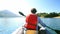 Woman kayaking on the Lokvarsko lake in Gorski kotar, Croatia