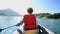 Woman kayaking on the Lokvarsko lake in Gorski kotar, Croatia