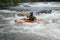 Woman kayaking in river